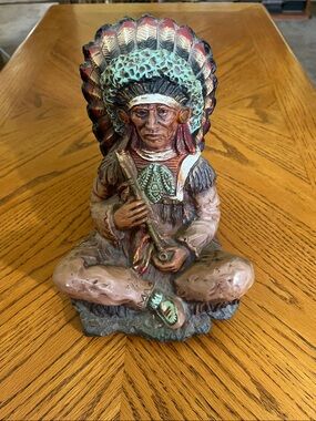 Universal statuary of sitting Indian chief